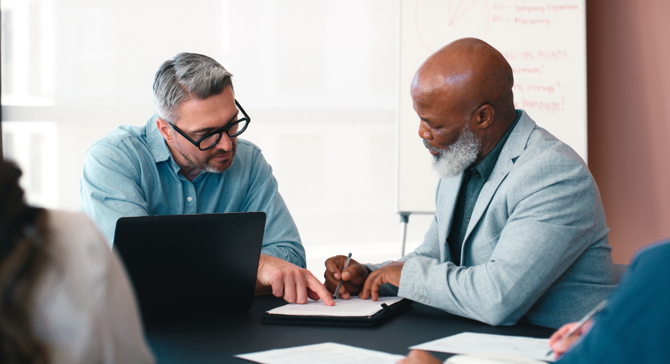 Advisor reviewing a personalized financial plan with a client